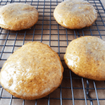 The maple cookies are sitting on a cooling rack.