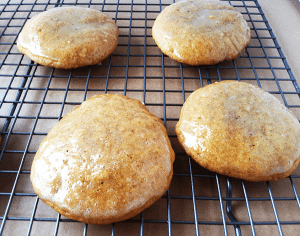 The maple cookies are sitting on a cooling rack.