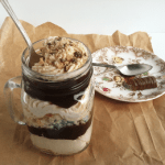 A Twix trifle served in a mason jar.