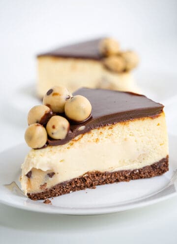 slice of salted caramel cookie dough cheesecake on a white plate