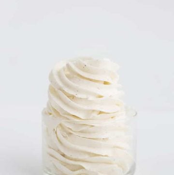 Perfectly piped swirls of swiss meringue buttercream shot from the side