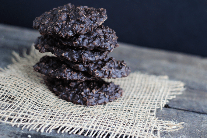 stack of 4 Chocolate no bake cookies on a piece of burlap