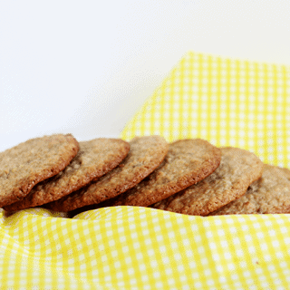 Crumble cookies arranged on a yellow checkered napkin.