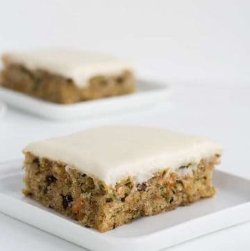 Picture of the zucchini bars on a white plate and white background