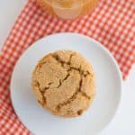 overhead photo of one apple cider snap cookie on white plate