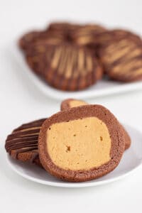 Buckeye cookies on a white plate.