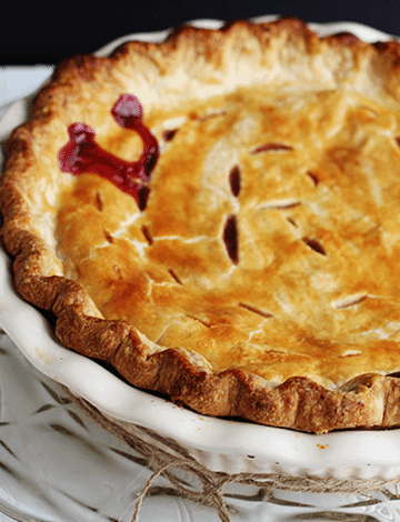 Raspberry Pie - fresh raspberries with a dash of cinnamon and stuffed in the perfect pie crust!