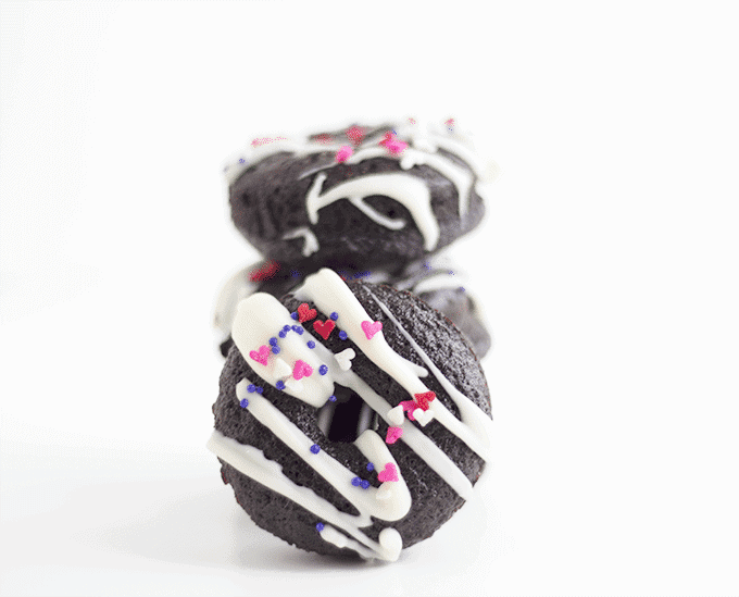 Stacked chocolate donuts.