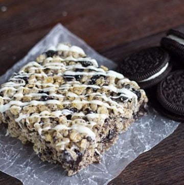 A Cookies & Cream Rice Crispy Treat placed on a piece of paper.