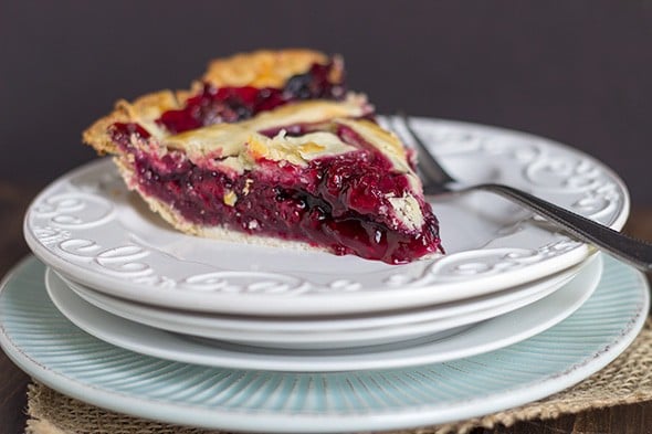 slice of fresh blueberry-blackberry pie on a plate