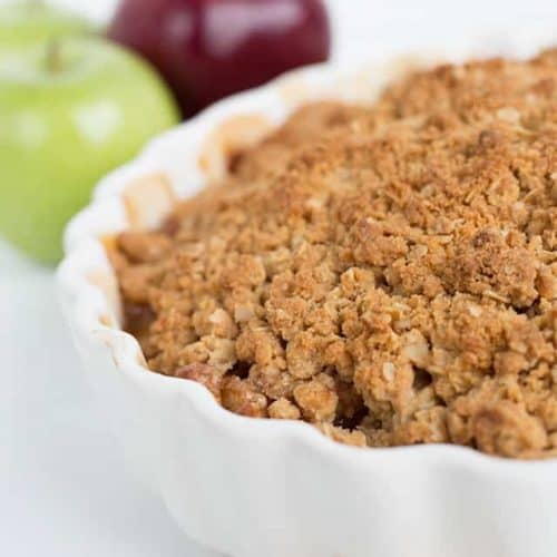 Peanut butter apple crisp in a white dish.