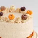 A Pumpkin Spice Cake decorated with icing.