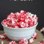 Cinnamon popcorn sprinkled with red and white.