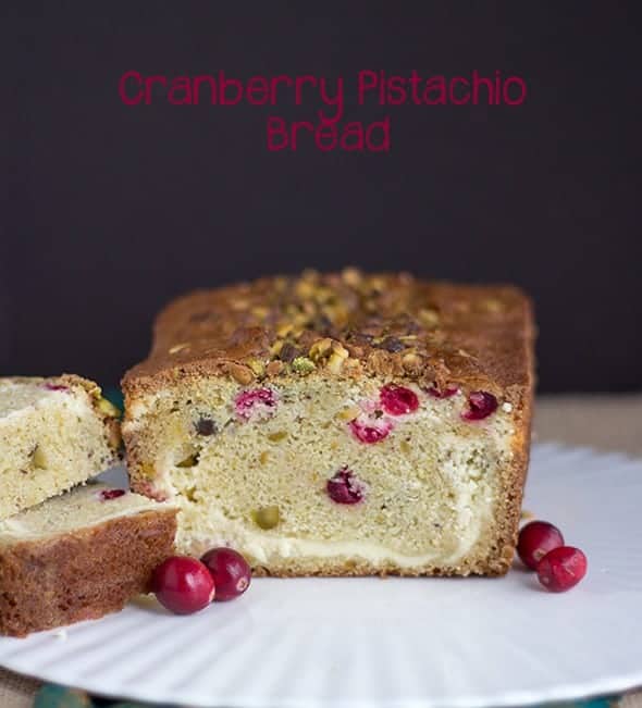 Cranberry pistachio bread on a plate.
