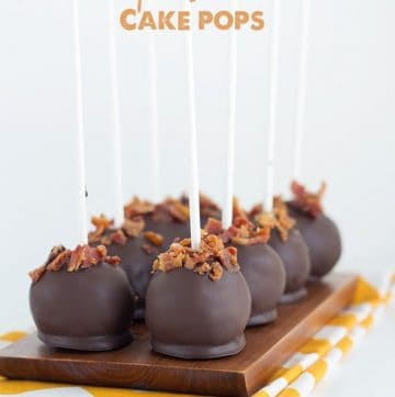 Maple bacon cake pops presented on a yellow napkin.