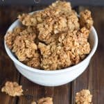 Peanut butter granola on wooden table.