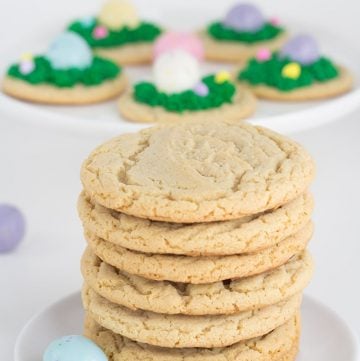 A stack of Malted Milk Cookies on a white plate.