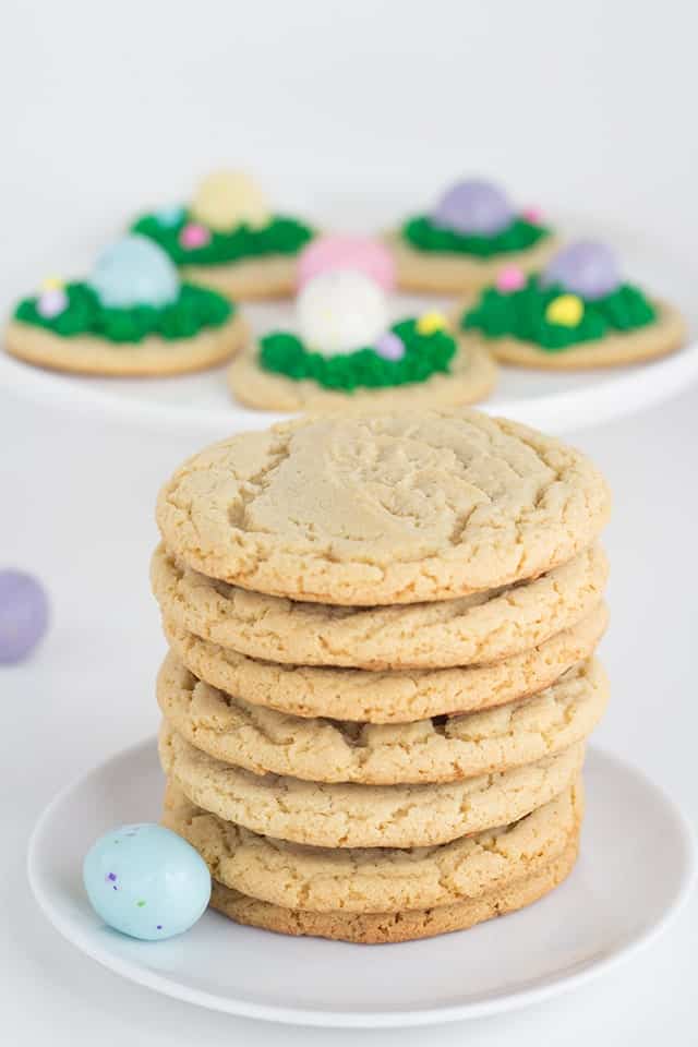 A stack of Malted Milk Cookies on a white plate.