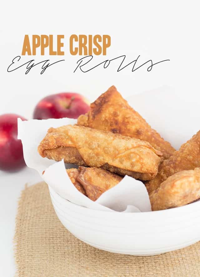 Apple crisp egg rolls in a white bowl.