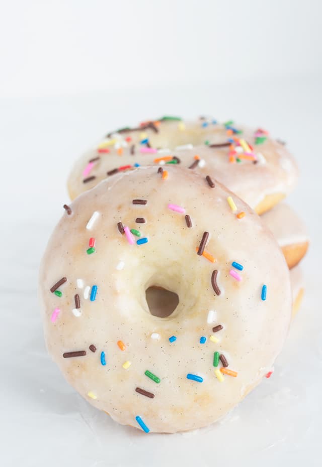 Glazed Baked Yeast Donuts with sprinkles