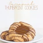 Caramel thumbprint cookies on a plate.