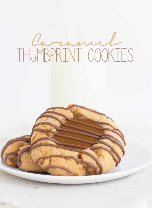 Caramel thumbprint cookies on a plate.