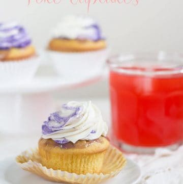 Kool-Aid poke cupcakes on a plate.