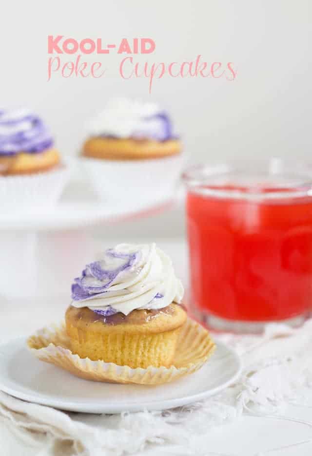 Kool-Aid poke cupcakes on a plate.