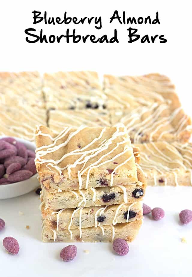 Blueberry Almond Shortbread Bars - buttery shortbread bars full of dried wild blueberries, chopped blueberry almonds and almond paste. The perfect chewy bar.