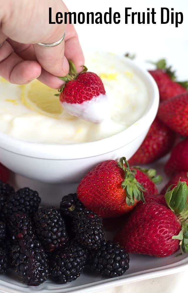 Lemonade fruit dip with strawberries and blackberries.