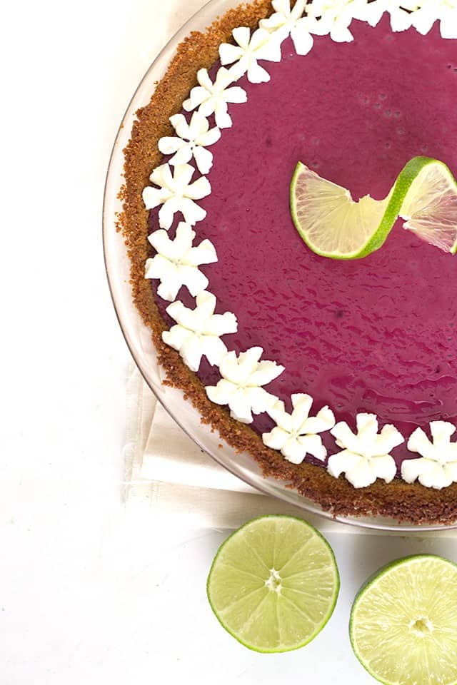 Blackberry Key Lime Pie - Sweet and Tart Twist on a classic Key Lime Pie. It's creamy and gorgeous to look at.