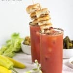 Garlic Bacon Grilled Cheese Garnished Bloody Mary - These are the perfect drinks for a tailgating party. You can have a bite to eat and a delicious zesty drink all in one cup.
