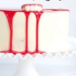 Goosebumps White Vampire Bite Cake - homemade white cake with a vanilla frosting and a blood red white chocolate ganache. Sugar Cookie in cake form? Yes, please.