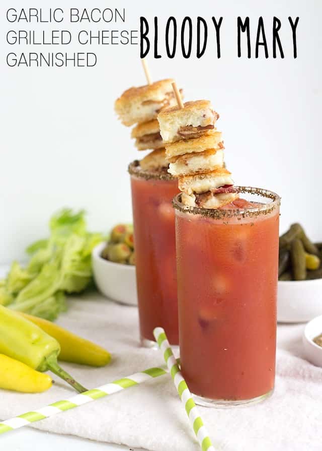 Grilled cheese garnished bloody mary with garlic bacon.