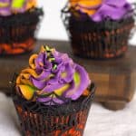 Three Halloween swirled cupcakes.