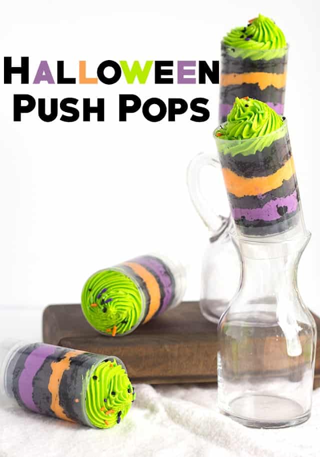 Easy Halloween Push Pops - Fun and colorful halloween colored push pops filled with vanilla frosting and vanilla cake colored black.