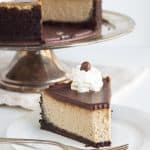 Mocha Cheesecake with Boozy Mocha Ganache - Chocolate and coffee come together in this cheesecake and ganache. There's a kick of coffee liqueur in the ganache too! If you're an iced coffee lover, you'll love this cheesecake.