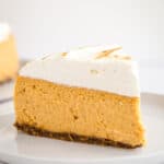 slice of sweet potato cheesecake on white plate