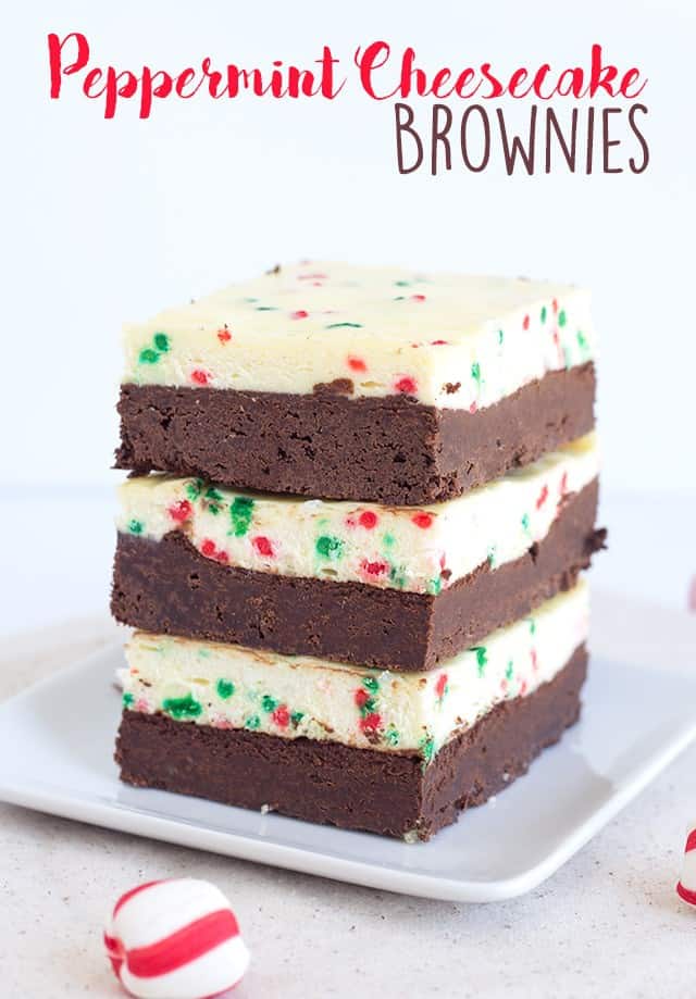 Peppermint Cheesecake Brownies - thick, fudgy dark chocolate brownies topping with a peppermint cheesecake. Throwing in some Christmas sprinkles is a must for the holidays!