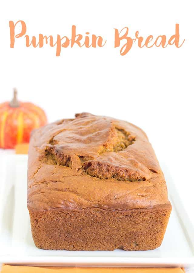 A slice of pumpkin bread on a plate.