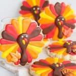 Thanksgiving cookies designed as adorable turkeys.