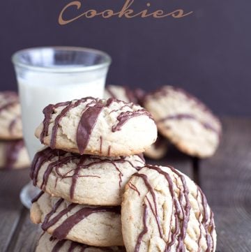 Coffee cookies with chocolate drizzle and milk.