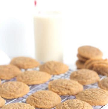 Peanut butter cookies on a cooling rack.