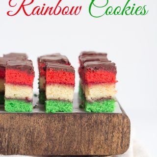 Colorful cookies on a wooden surface.