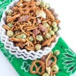 St. Patrick's Day snack mix with wasabi and soy sauce flavors in a bowl on a green napkin.