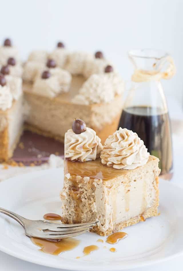 a slice of Coffee Cheesecake with a bite taken out of it