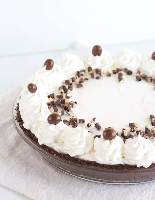 Mocha Cream Pie - a chocolate coffee pudding with a whipped cream topping and finished with espresso beans and chocolate curls