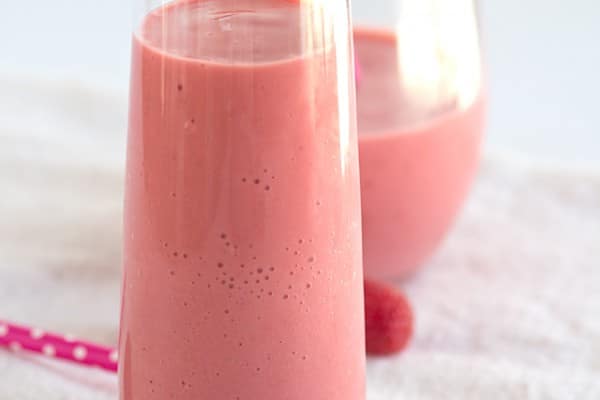 Raspberry Peach Smoothie - thick and creamy smoothie packed full of frozen raspberries and peaches!