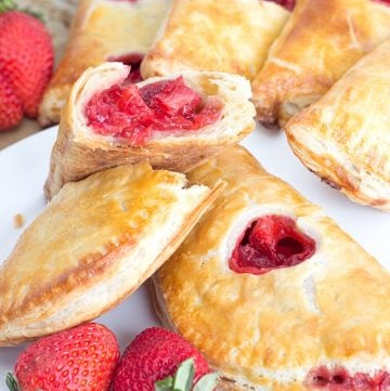 stacked strawberry hand pies showing the inside