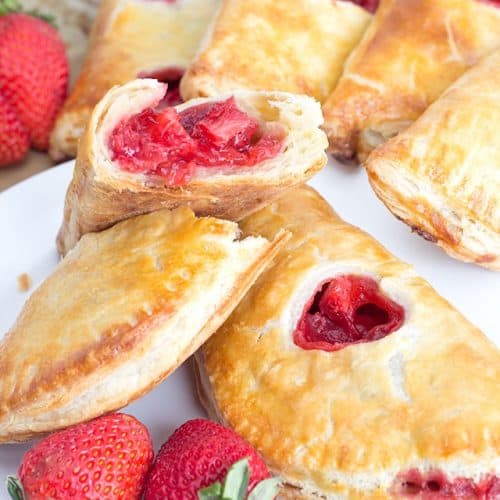 stacked strawberry hand pies showing the inside